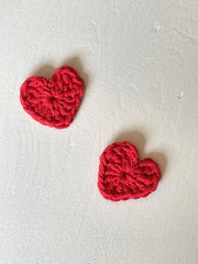 Stitched together heart pins